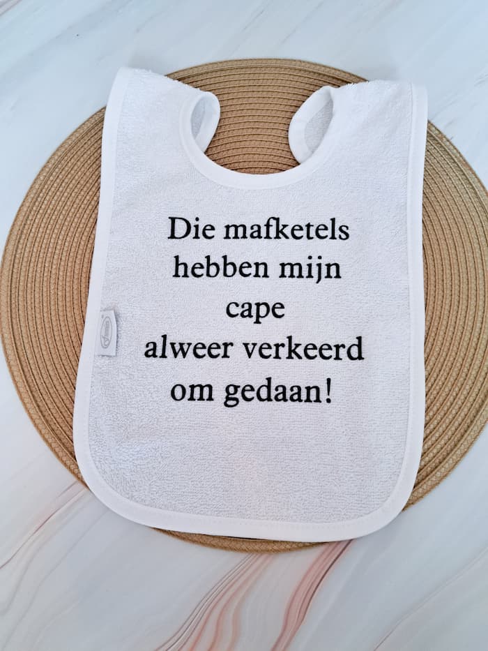 Slabbetje met tekst wit