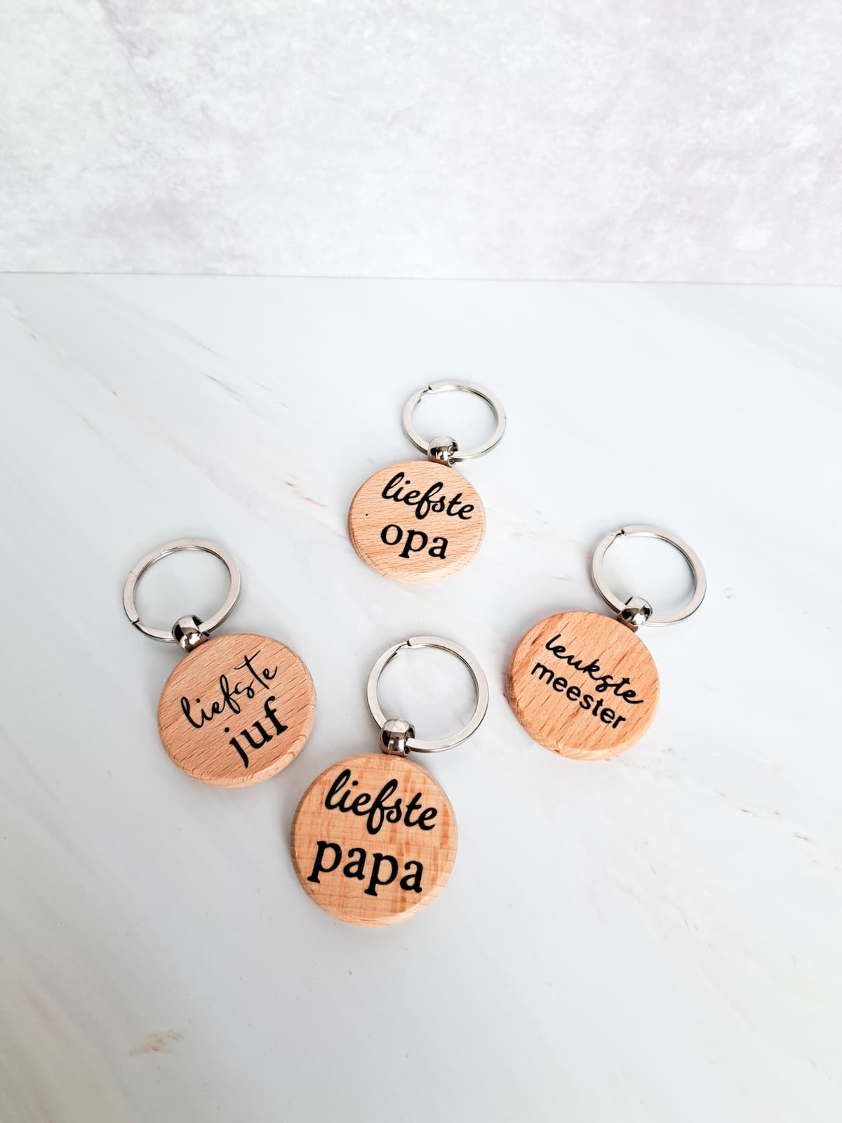 Ronde houten sleutelhanger. met logo | vanaf € 0.56